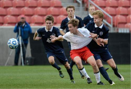 Francisco Kjolseth  |  The Salt Lake Tribune 
Isaac Jacobs of East gets a little help with his wardrobe as he battles Skyline in game action during the 4A boys' soccer championship game at Rio Tinto Stadium on Thursday, May 21, 2015.