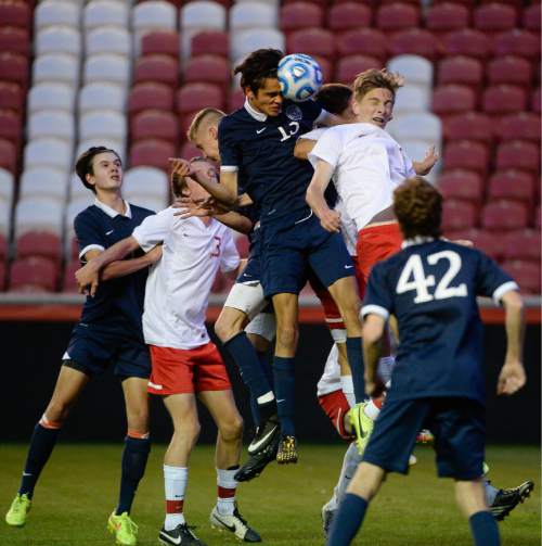 Francisco Kjolseth  |  The Salt Lake Tribune 
Skyline's Sheldon Martineau flattens the ball as he wins a header against East in game action during the 4A boys' soccer championship game at Rio Tinto Stadium on Thursday, May 21, 2015.
