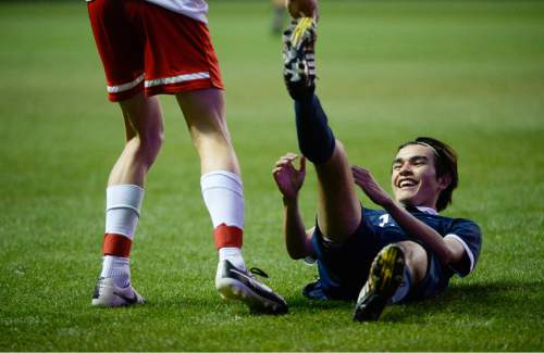 Francisco Kjolseth  |  The Salt Lake Tribune 
Skyline's Sheldon Martineau gets a kind stretch from an East high player as both teams feel the ravages of a double over time game during the 4A boys' soccer championship game at Rio Tinto Stadium on Thursday, May 21, 2015.