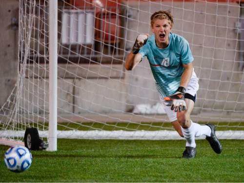 Francisco Kjolseth  |  The Salt Lake Tribune 
Goalie Will DeSantis of Skyline is pumped to block a shot in shoot out against East during the 4A boys' soccer championship game at Rio Tinto Stadium on Thursday, May 21, 2015.