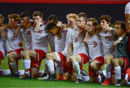 Francisco Kjolseth  |  The Salt Lake Tribune 
The East High line up maintains a somber stance as the shoot out following a double over time against Skyline fails to go their way during the 4A boys' soccer championship game at Rio Tinto Stadium on Thursday, May 21, 2015.