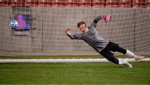 Francisco Kjolseth  |  The Salt Lake Tribune 
Jack Thompson of East sees the championship slip away in shoot out against Skyline in the 4A boys' soccer championship game at Rio Tinto Stadium on Thursday, May 21, 2015.