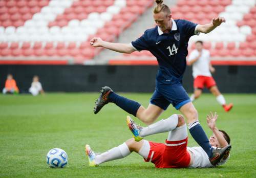 Francisco Kjolseth  |  The Salt Lake Tribune 
Skyline's Josh Kirk gets the better deal as Hugo Olivera of East tries to avoid getting stepped in game action during the 4A boys' soccer championship game at Rio Tinto Stadium on Thursday, May 21, 2015.
