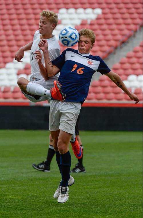 Francisco Kjolseth  |  The Salt Lake Tribune 
Alta's Gabe Aguilar, 7, goes up agains Andrew Peterson, 16, of Brighton in game action during the 5A boys' soccer championship game at Rio Tinto Stadium on Thursday, May 21, 2015.