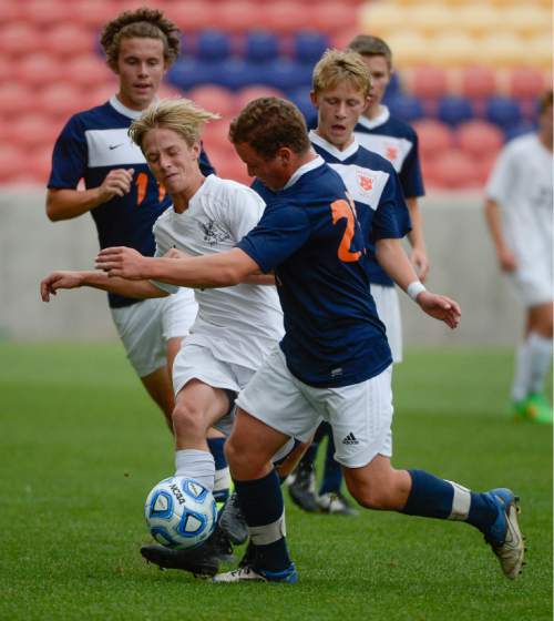 Francisco Kjolseth  |  The Salt Lake Tribune 
Alta's Josh Affleck, left, collides with Spencer Campbell of Brighton in game action during the 5A boys' soccer championship game at Rio Tinto Stadium on Thursday, May 21, 2015.