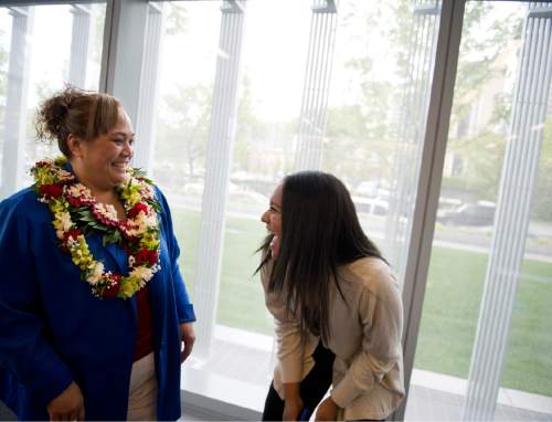 Lennie Mahler  |  The Salt Lake Tribune

Sive'a Va'aulu Faasou, originally from Samoa, and her daughter, Melanie, talk after a naturalization ceremony in which Faasou became a U.S. citizen, along with 100 other immigrants from 40 countries, at the U.S. District Courthouse in downtown Salt Lake City, Friday, May 22, 2015.
