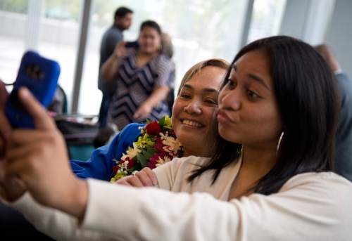 Lennie Mahler  |  The Salt Lake Tribune

Sive'a Va'aulu Faasou, originally from Samoa, and her daughter, Melanie, take a selfie after a naturalization ceremony in which Faasou became a U.S. citizen, along with 100 other immigrants from 40 countries, at the U.S. District Courthouse in downtown Salt Lake City, Friday, May 22, 2015.