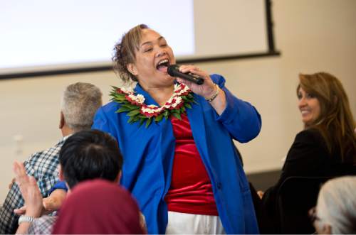 Lennie Mahler  |  The Salt Lake Tribune

Sive'a Va'aulu Faasou, originally from Samoa, introduces herself to the room during a ceremony in which Faasou became a U.S. citizen, along with 100 other immigrants from 40 countries, at the U.S. District Courthouse in downtown Salt Lake City, Friday, May 22, 2015.