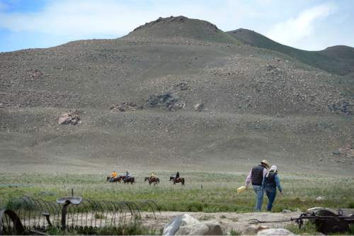 Scott Sommerdorf   |  The Salt Lake Tribune
Riders take a ride on horses for rent at the Cowboy Legends Cowboy Poetry and Music Festival at the Fielding-Garr Ranch on Antelope Island, Saturday, May 23, 2015.
