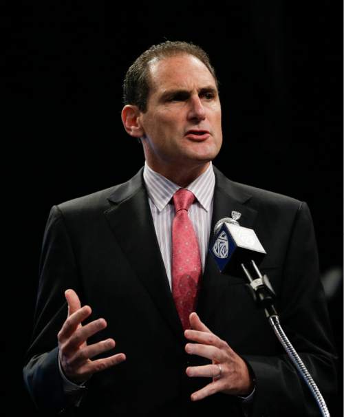Pac-12 Commissioner Larry Scott talks to the media during the NCAA college football Pac-12 Media Day on Friday, July 26, 2013, in Culver City, Calif. (AP Photo/Jae C. Hong)
