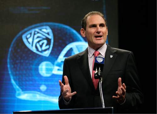 Pac-12 Commissioner Larry Scott talks to the media during the NCAA college football Pac-12 Media Day on Friday, July 26, 2013, in Culver City, Calif. (AP Photo/Jae C. Hong)