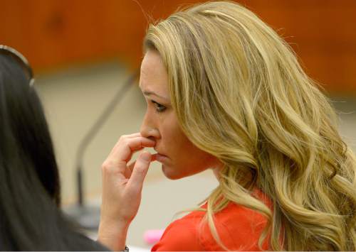 Leah Hogsten  |  Tribune file photo
Brianne Altice listens in January to the testimony of a teenager who gave details about his sexual relationship when he was 17-years old with Altice, his former Davis High School teacher during a preliminary hearing in 2nd District Court. The boy's family has filed suit against Davis County School District seeking damages for abuse by Altice.