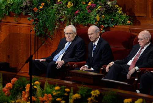 Scott Sommerdorf  |  The Salt Lake Tribune
Elder L. Tom Perry, left, Russell M. Nelson, center, and Dallin H. Oaks, right, sit as the 184th Semiannual General Conference of the Church of Jesus Christ of Latter Day Saints begins, Sunday, October 5, 2014.