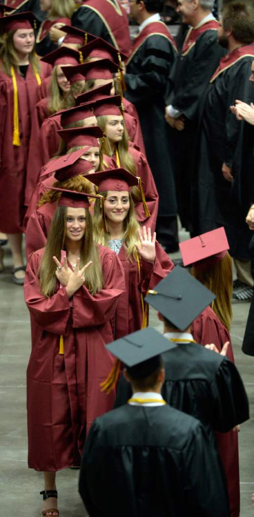 Al Hartmann |  The Salt Lake Tribune
The largest senior graduating class of Lone Peak High School marches in procession into the UCUU Events Center Thursday May 28, 2015, for commencement excercises.