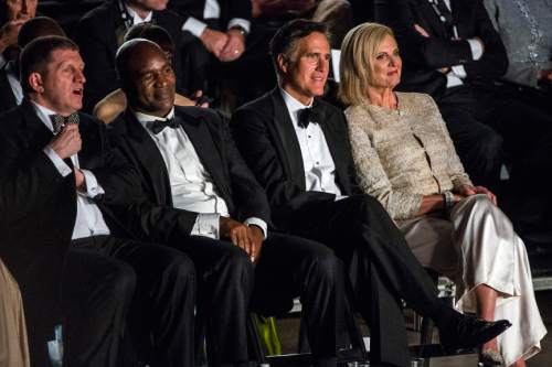 Chris Detrick  |  The Salt Lake Tribune
Mitt Romney, Ann Romney and Evander Holyfield watch the boxing matches at the Rail Event Center Friday May 15, 2015. Friday's Romney-Holyfield showdown will raise about $1 million for CharityVision, a 20-year-old nonprofit dedicated to saving the eyesight of impoverished people in developing nations.