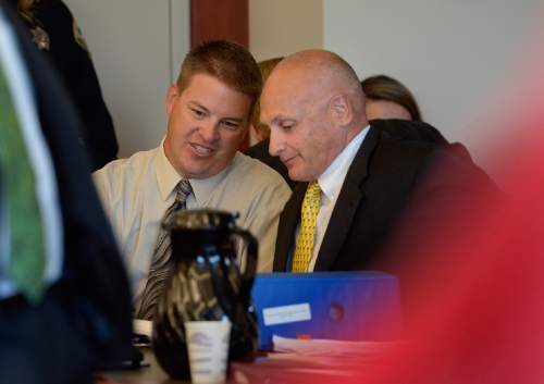 Scott Sommerdorf  |  The Salt Lake Tribune
Former West Valley City police officer Shaun Cowley, left, confers with defense investigator Bruce Champagne during day three of Cowley's preliminary hearing, Wednesday, October 8, 2014. Cowley is charged with second-degree felony manslaughter for Nov. 2, 2012, fatal shooting of 21-year-old Danielle Willard.