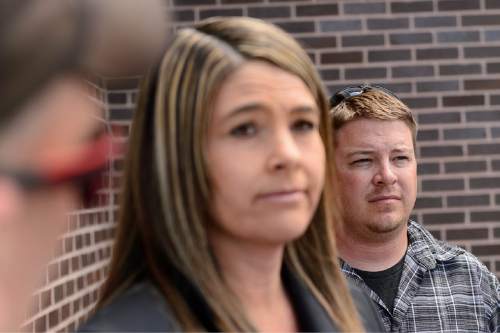 Trent Nelson  |  The Salt Lake Tribune
Shaun Cowley's attorney Lindsay Jarvis, left, says that Cowley, right, has been reinstated as an officer with West Valley City, Wednesday June 3, 2015. Cowley was put on leave in November 2012 after firing the shot that killed Danielle Willard.