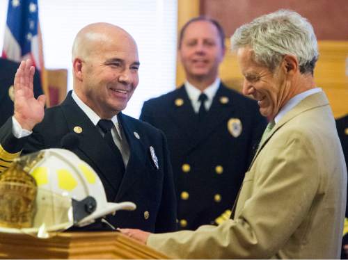Rick Egan  |  The Salt Lake Tribune

Salt Lake City Mayor Ralph Becker swears in the new Salt Lake City fire chief, Brian Dale, at City Hall, Thursday, June 4, 2015.