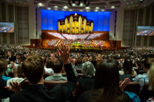 Chris Detrick  |  The Salt Lake Tribune
Mormons sustain a vote during the afternoon session of the 184th Semiannual General Conference of The Church of Jesus Christ of Latter-day Saints Saturday April 5, 2014.