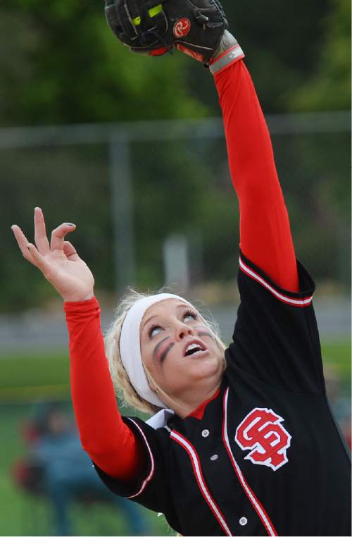 Steve Griffin  |  The Salt Lake Tribune


Spanish Fork's Cheyenne Pratt stretches as she snags a fly ball during the 4A softball championship game between Maple Mountain and Spanish Fork at the Valley Softball Complex in Taylorsville, Friday, May 22, 2015.