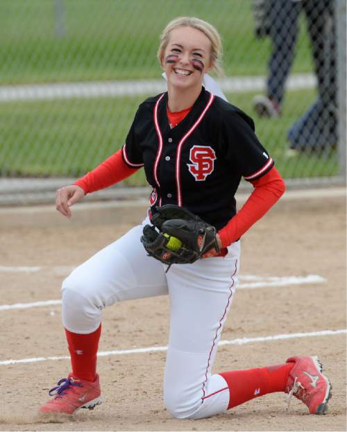 Steve Griffin  |  The Salt Lake Tribune


Spanish Fork third baseman McKenzie Branch smiles after she snag a ripped line drive for and out during the 4A softball championship game between Maple Mountain and Spanish Fork at th eValley Softball Complex in Taylorsville, Friday, May 22, 2015.