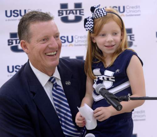 Al Hartmann |  The Salt Lake Tribune
Utah State University introduced John Hartwell as its new vice president and director of athletics at the Wayne Estes Center Wednesday June 3, 2015, in Logan. His daughter Lauren, 6, dressed in an Aggie uniform, gave a short speech too.  She said that she was proud to be an Aggie, and yelled, "Go Aggies!"
