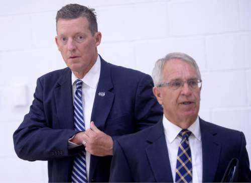 Al Hartmann |  The Salt Lake Tribune
Utah State University President Stan L. Albrecht, right, announced the hiring of John Hartwell as USU's new vice president and director of athletics at the Wayne Estes Center Wednesday June 3, 2015, in Logan.  He will begin his duties in mid-July.