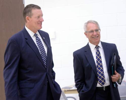 Al Hartmann |  The Salt Lake Tribune
Utah State University President Stan L. Albrecht, right, announced the hiring of John Hartwell as USU's new vice president and director of athletics at the Wayne Estes Center Wednesday June 3, 2015, in Logan. He will begin his duties in mid-July.