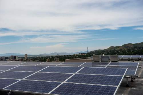 Chris Detrick  |  The Salt Lake Tribune
Solar panels on top of the University of Utah's Marriott Library Friday June 5, 2015. The U.S. Environmental Protection Agency has once again recognized the University of Utah as a top school for green power purchasing in its College and University Green Power Challenge.
