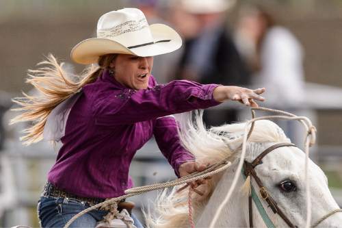 Trent Nelson  |  The Salt Lake Tribune
Kassie Cattoor competes in Breakaway Roping at the Utah High School Rodeo Association state championships in Heber, Saturday June 6, 2015.
