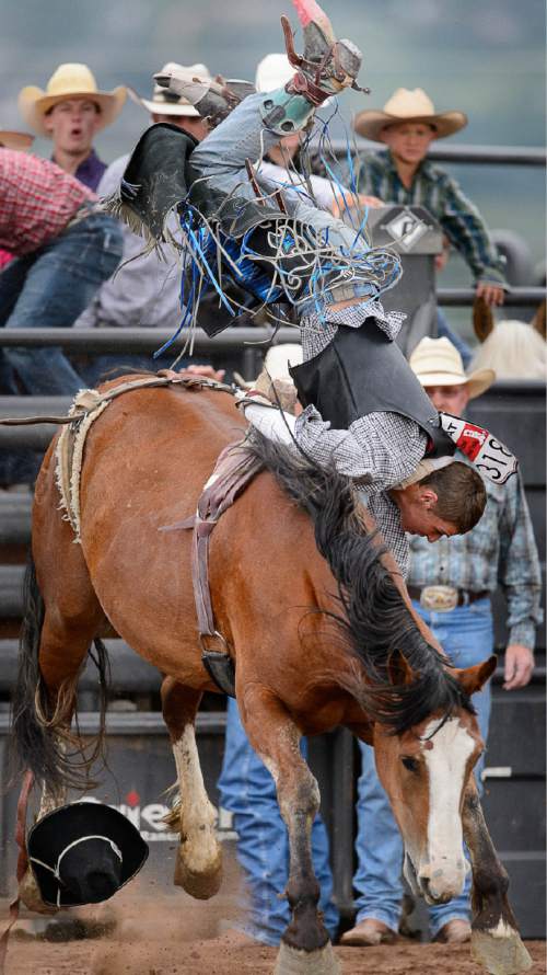 Trent Nelson  |  The Salt Lake Tribune
Austin Thomas competes in Bareback at the Utah High School Rodeo Association state championships in Heber, Saturday June 6, 2015.