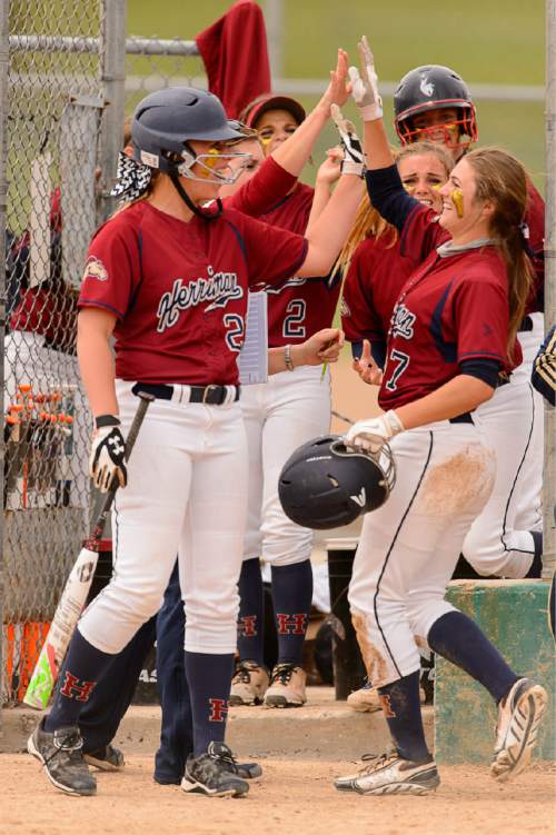 Trent Nelson  |  The Salt Lake Tribune
Herriman's Cassidy Adams (7) celebrates scoring as Herriman faces Lehi in the 5A high school softball championship game, in West Valley City, Friday May 22, 2015.