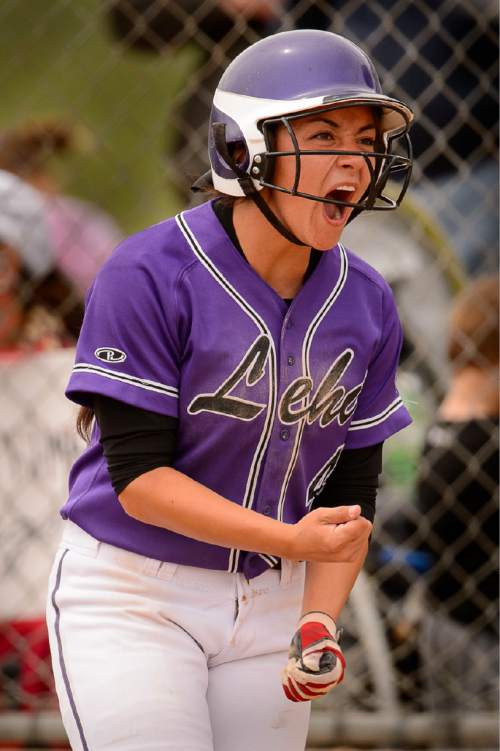 Trent Nelson  |  The Salt Lake Tribune
Lehi's Taylor Tahbo celebrates after scoring as Herriman faces Lehi in the 5A high school softball championship game, in West Valley City, Friday May 22, 2015.