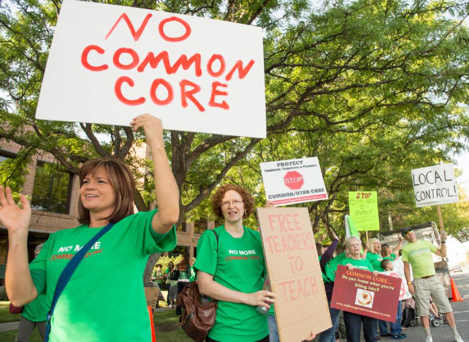 Rick Egan  |  Tribune file photo

Opponents of Utah's Common Core protest  outside the State Board of Education meeting, Friday, August 8, 2014. Utah's attorney general has accepted tens of thousands of dollars in campaign contributions from a wealthy opponent of Common Core standards in education.
