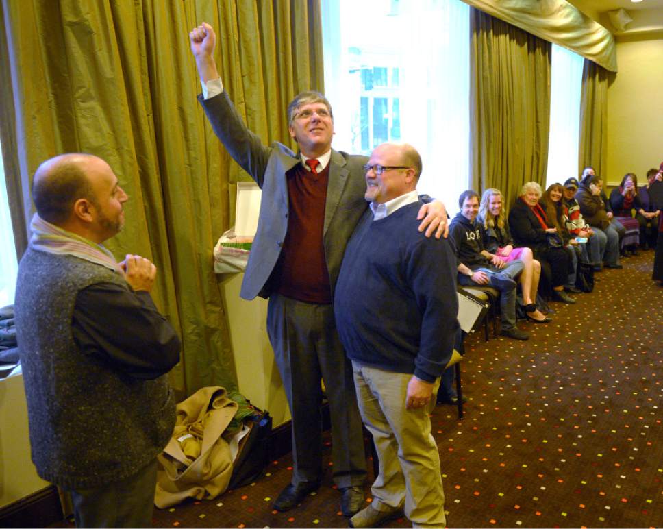 Steve Griffin  |  Tribune file photo


Gage Church holds his fist up as he and his husband, Tim Sharp, are married by Father Robert Trujillo, of Glory To God Old Catholic Church, at the Hampton Inn Suites in Ogden, Utah Monday, December 23, 2013. Utah's attorney general has taken $65,000 in campaign contributions from a New Jersey activist against gay marriage and Common Core standards in education.