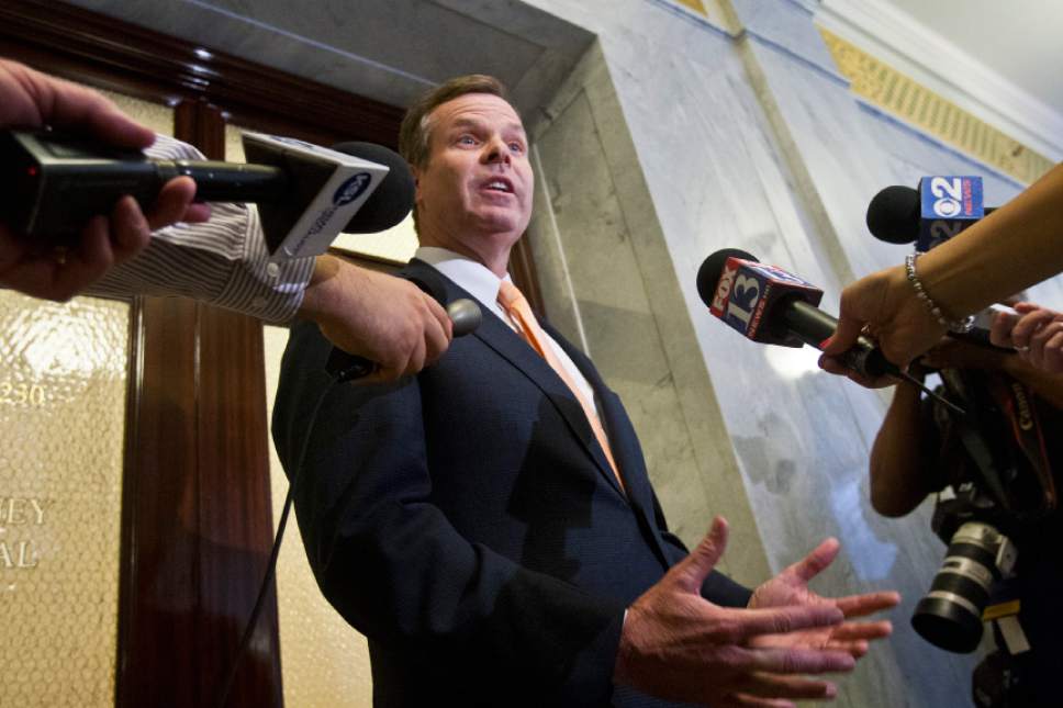 Chris Detrick  |  Tribune file photo

Then-Attorney General John Swallow talks to members of the media outside of his office at the Utah State Capitol Wednesday June 19, 2013.