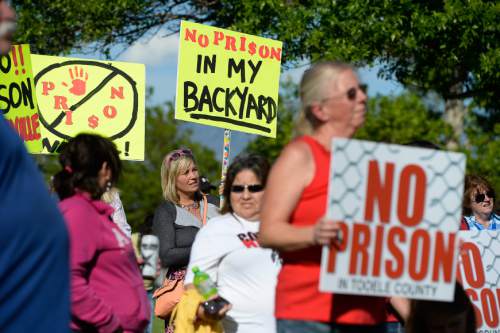 Francisco Kjolseth  |  The Salt Lake Tribune 
Public officials and residents opposed to moving the prison to Tooele rally at the Grantsville City Park, while the Prison Relocation Commission holds its public meeting at the high school across the street on Thursday, May 28, 2015.