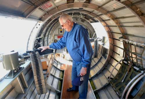 Al Hartmann |  The Salt Lake Tribune
World War II Marine Charles Kallman, 88, of Provo, leans on a 50-caliber machine gun, looking out the body of a restored B-17 Flying Fortress called Sentimental Journey at the Heber City Airport Tuesday, June 8 2015.  The B-17 is one of several restored vintage World War II planes on display. Kallman was one of serveral World War II veterans that climbed through the plane Tuesday. He fought at Iwo Jima and later joined the Army Air Corps and flew B-29s and B-52s.  Sentimental Journey is giving tours and rides for a fee through Sunday.