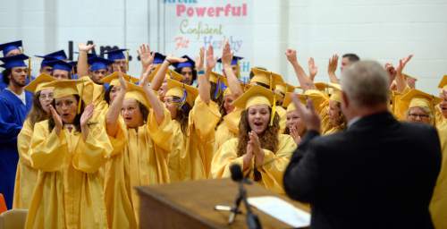 Al Hartmann |  The Salt Lake Tribune
Utah State Prison inmates from South Park Academy applaud as they are accepted as high school graduates at a commencement ceremony Wednesday June 10, 2015. About 150 men and women serving time at the prison received high school diplomas during the ceremony.