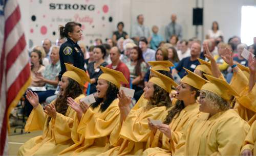 Al Hartmann |  The Salt Lake Tribune
Female inmates at the Utah State Prison in Draper applaud a graduation speech made by fellow inmate Aileen Trujillo during a graduation commencement ceremony from South Park Academy Wednesday June 10, 2015. About 150 men and women serving time at the prison received diplomas at the ceremony.