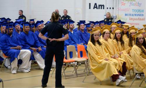 Al Hartmann |  The Salt Lake Tribune
Utah State Prison inmates from South Park Academy attend a graduation commencement ceremony Wednesday June 10, 2015. Family members attended just like any graduation but with the addition of corrections guards.  About 150 men and women serving time at the prison received diplomas at the ceremony.