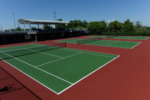 Francisco Kjolseth  |  The Salt Lake Tribune
The University of Utah finalizes work on six new outdoor tennis courts adjacent to the George S. Eccles Tennis Center.