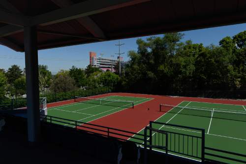 Francisco Kjolseth  |  The Salt Lake Tribune
The University of Utah finalizes work on six new outdoor tennis courts adjacent to the George S. Eccles Tennis Center.