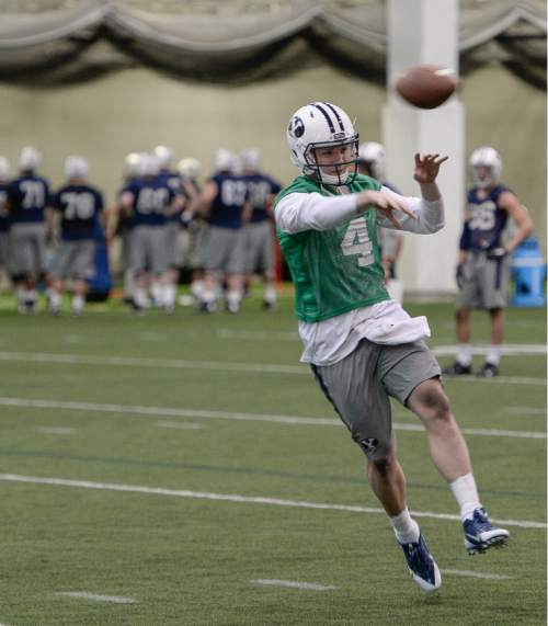Francisco Kjolseth  |  The Salt Lake Tribune 
BYU football opens spring camp on Monday, March 2, 2015, as quarterback Tayson Hill joins the indoor practice at the Smith Fieldhouse.