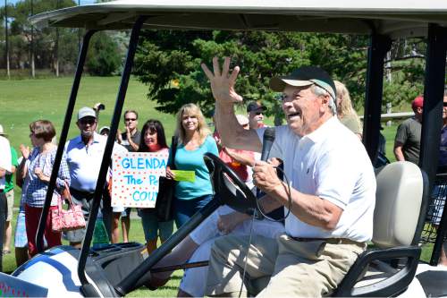 Scott Sommerdorf   |  The Salt Lake Tribune
Longtime Glendale golf pro Tim Reese thanks the crowd after giving a speech from the seat of his golf cart during a rally to save Glendale Golf Course, organized by mayoral hopeful Jackie Biskupski, Saturday, June 13, 2015. Earlier this year, the City Council voted to turn the links into a park that would have various functions, including soccer, football and baseball.