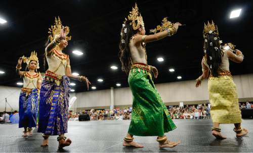 Francisco Kjolseth  |  The Salt Lake Tribune
The Cambodian Khemera Dance Troupe takes to the stage for the 38th Annual Asian Festival that celebrates Asian cultures with dance, music, food and more at the South Towne Expo Center on Saturday, June 13, 2015. This year the festival features Utah's Bhutanese, Cambodian, Chinese, Filipino, Indian, Indonesian, Japanese, Korean, Laotian, Taiwanese, Thai, Tibetan and Vietnamese communities.