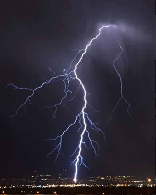 Lennie Mahler  |  The Salt Lake Tribune

A lightning storm dances across the Salt Lake valley Monday, June 15, 2015.