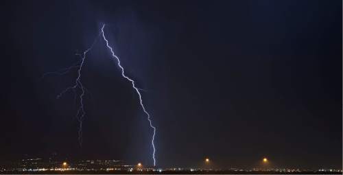 Lennie Mahler  |  The Salt Lake Tribune

A lightning storm dances across the Salt Lake valley Monday, June 15, 2015.