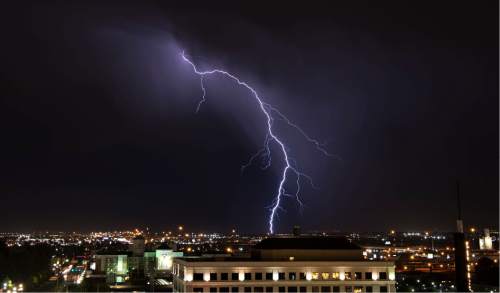 Lennie Mahler  |  The Salt Lake Tribune

A lightning storm dances across the Salt Lake valley Monday, June 15, 2015.