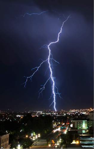 Lennie Mahler  |  The Salt Lake Tribune

A lightning storm dances across the Salt Lake valley Monday, June 15, 2015.